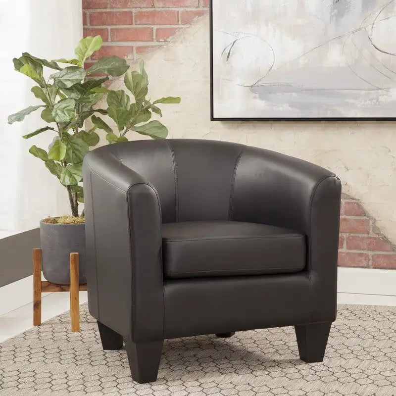 Fauteuil club capitonné
